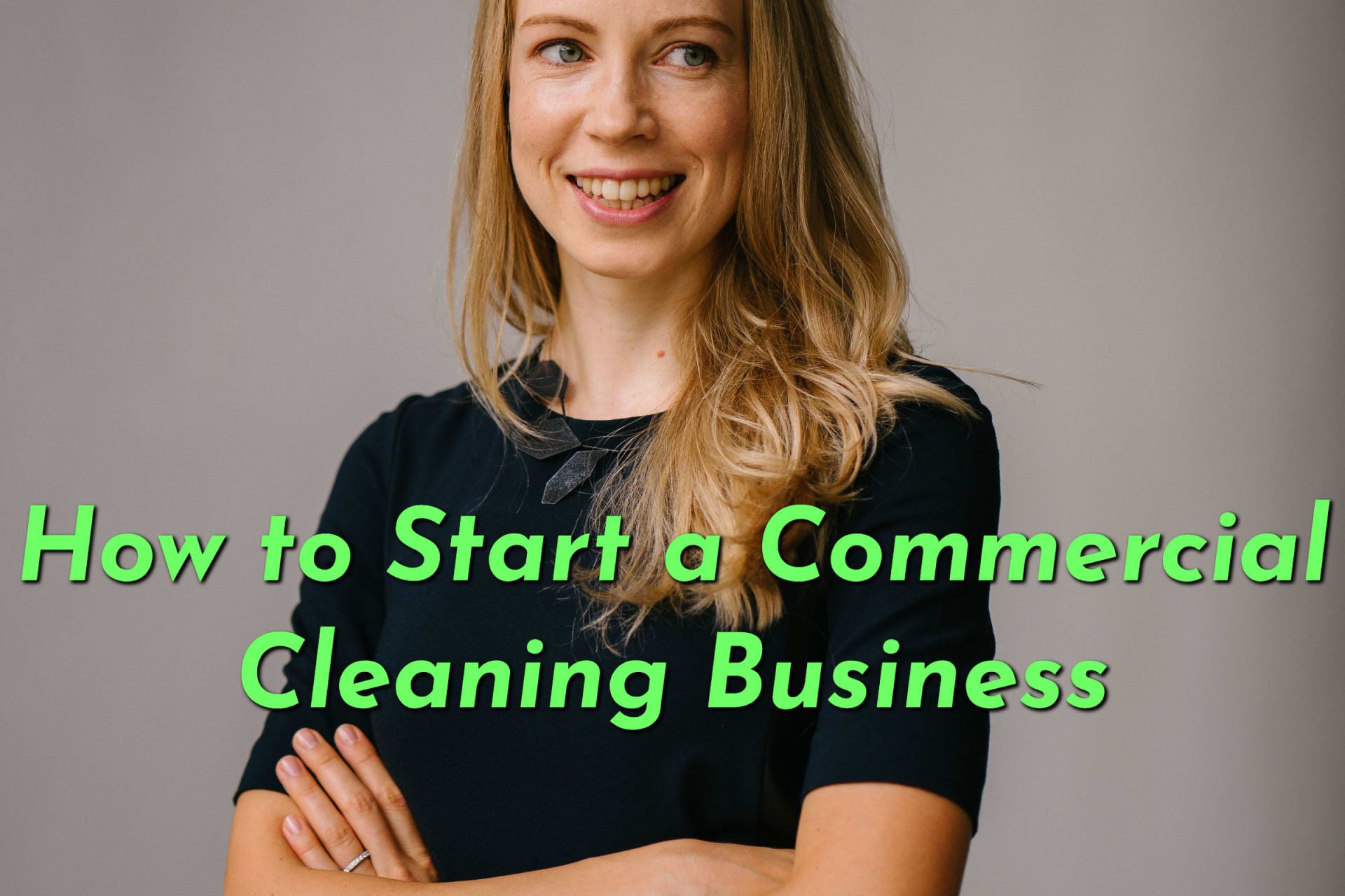 A woman excited about starting a commercial cleaning business